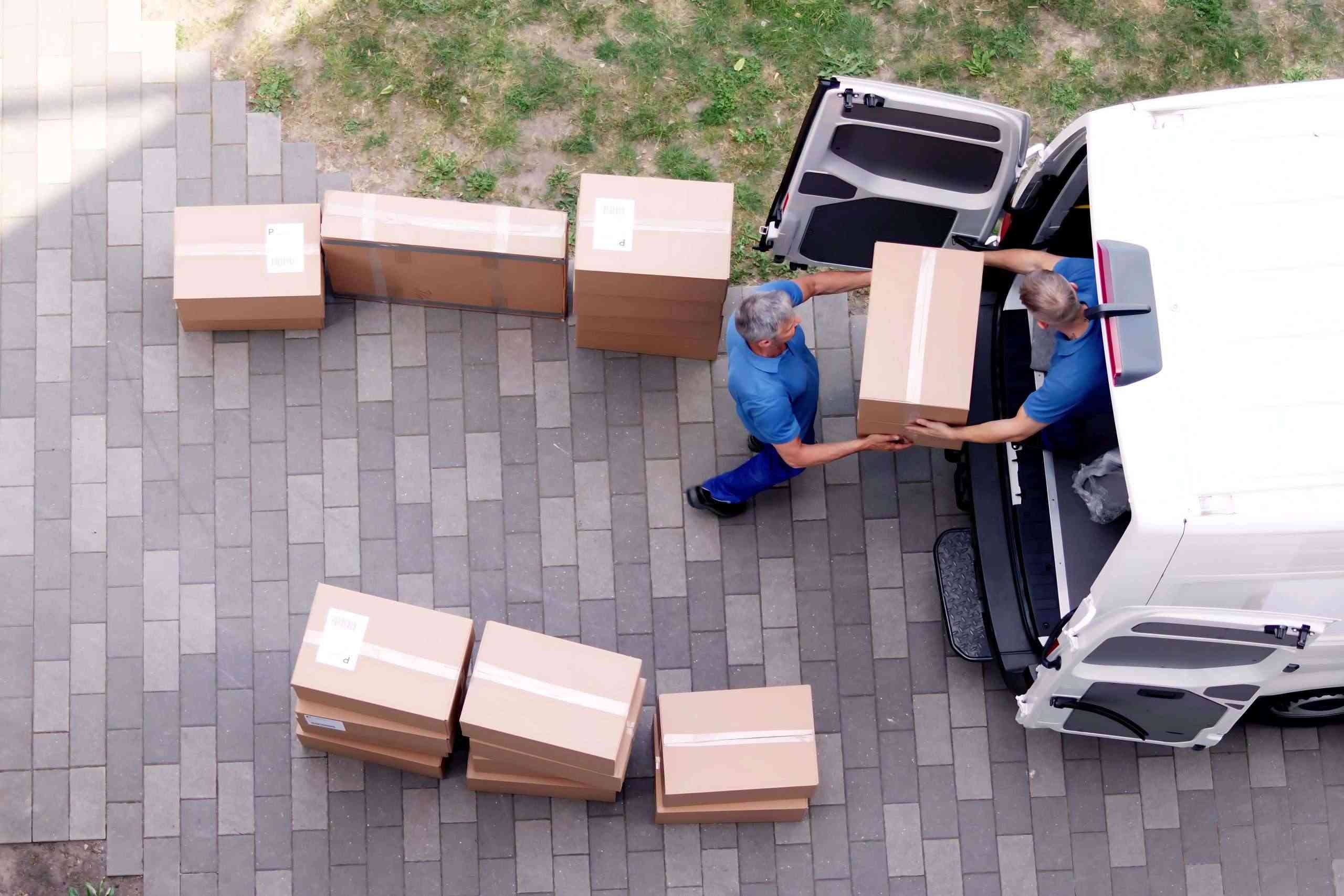 An aerial view of Lake Jackson movers loading boxes into a truck