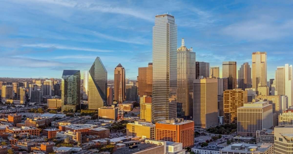 The skyline of Downtown Dallas on a partly cloudy afternoon