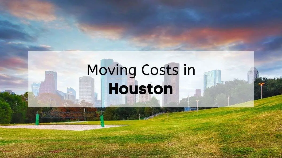 A view of a park with downtown Houston visible in the background on a cloudy day with the text “moving costs in Houston”