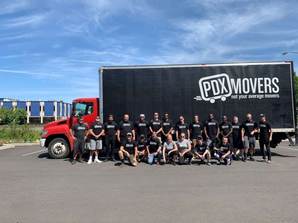 PDX Movers team in front of company truck